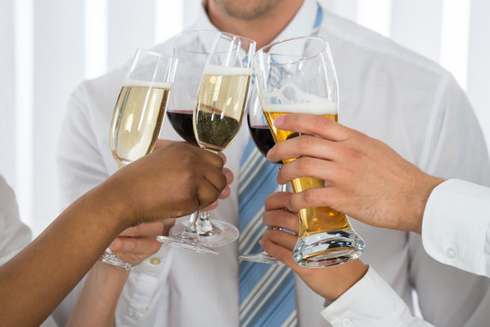 Businesspeople Hands Having Toast With Champagne