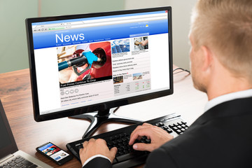 Businessman Reading News