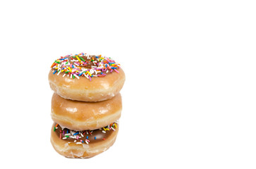 Three donuts line up vertically isolated on white background
