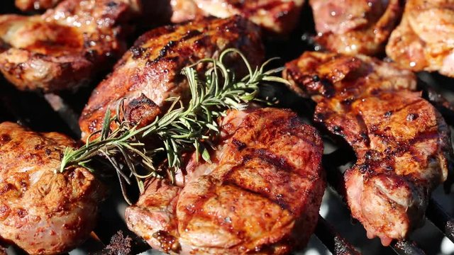 Fresh lamb meat with rosemary on the grill 