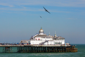 Avro Lancaster and Spitfire MK1 flying over Eastbourne Pier