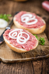 German Cuisine (bun with Mett; selective focus)
