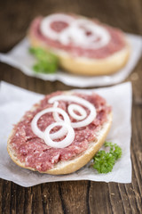 German Cuisine (bun with Mett; selective focus)