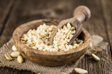 Chopped Peanuts (close-up shot; selective focus)
