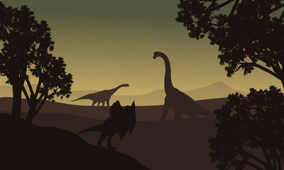 Dilophosaurus and Brachiosaurus silhouette in hills