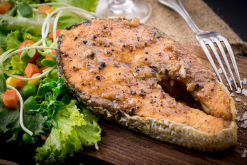 salmon steak with vegetables