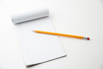 note pad and pencil