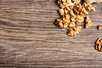 Nuts on wooden background in close up photo