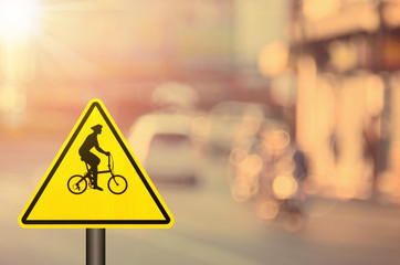 Traffic sign,bicycle sign on blur traffic road