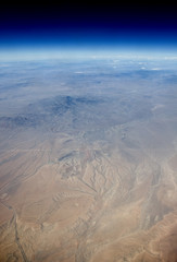 Fototapeta premium Aerial view of the Earth in space. The desert in the western United States. 