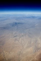 Cercles muraux Photo aérienne Aerial view of the Earth in space. The desert in the western United States. 