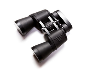Black binoculars isolated over white background
