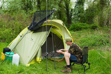 Fishing adventure, preparation fishing tackle .  Concepts: waiting, adventure, goal to reach, determination, peace, tranquility, relaxation, lifestyle