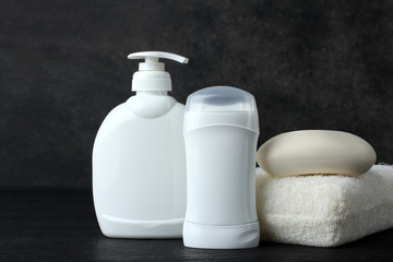 personal hygiene items on a black background