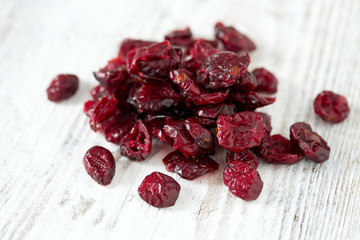 cranberry on wooden surface