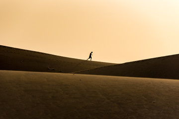 Men walking in the desert of gran canaria, spain