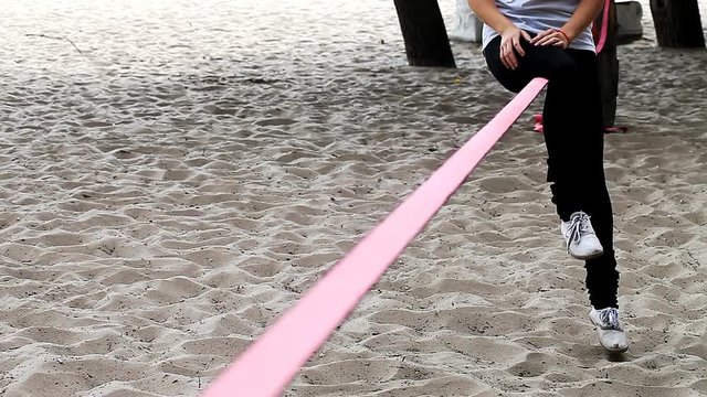 people practice a popular and growing Slacklining  / people practice a popular and growing Slacklining Full HD