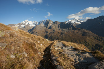 trekking in the Italian Alps; it's autumn with no people around