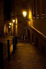  Narrow alley with lanterns in Prague at night