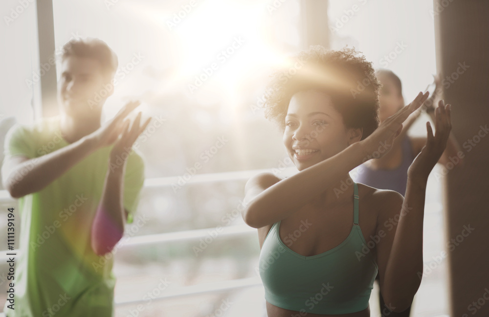 Canvas Prints group of smiling people dancing in gym or studio