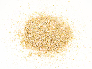 Fototapeta na wymiar Pile of oat bran isolated on white