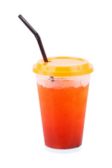Iced tea with straw in plastic glass isolated on white