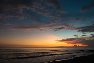 Fototapeta na wymiar Colored sunset at Balian beach, Bali, Indonesia