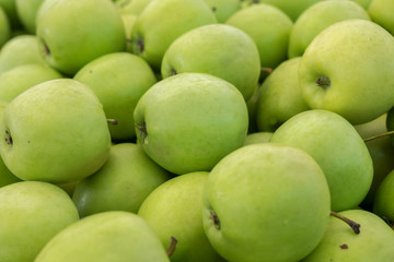 Green apples for sale at city market. Baku. Azerbaijan