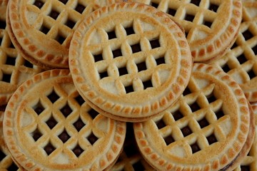 cookies with a design pattern and a chocolate filling