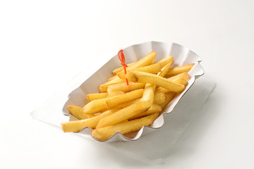French fries in paper plate on white background