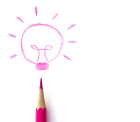 Pink crayons drawing light bulb, business idea concept