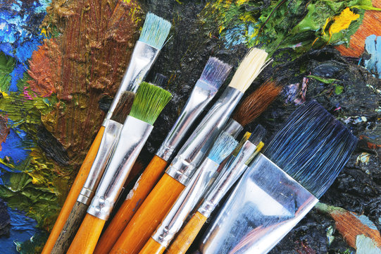 Set of brushes and an artist palette
