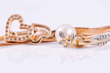 Gold earrings and ladies gold chain