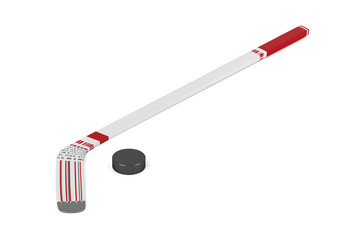 Ice hockey stick and puck