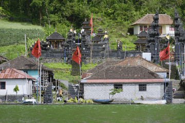 View of the ancient village Trunyan and Hindu Temple from Lake Batur, Bali, Indonesia