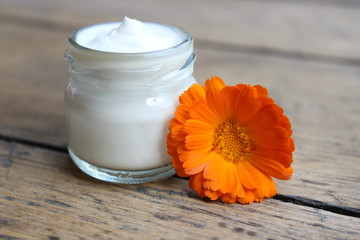 Face cream and calendula flower.Cosmetics.