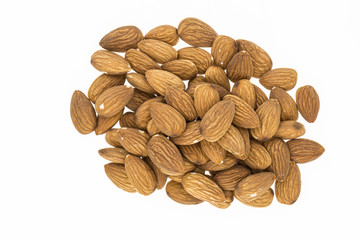Heap of  unblanched almonds, on white background