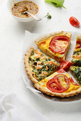 savory quiche with salmon and tomato
