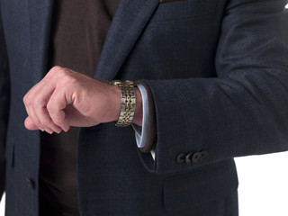 cropped image of a businessman checking time.