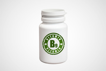 Bottle of pills with vitamin B9