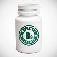 Bottle of pills with vitamin B9