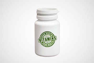 Bottle of pills with vitamins