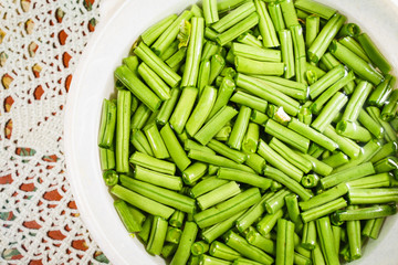 Close-up of green haricot in water