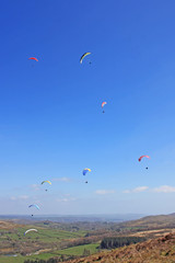 Fototapeta na wymiar Paragliders above Dartmoor, Devon