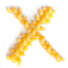 Letter X made of macaroni under a daylight isolated on white background