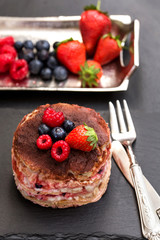 homemade tiamisu with custard cream and berry fruits