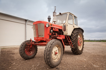 Obraz premium Old red russian tractor