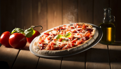 Pizza with bacon on the wooden table - 111171530