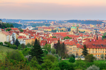 Spring Prague panorama from Prague Hill with Prague Castle, Vltava river and historical architecture. Concept of Europe travel, sightseeing and tourism.