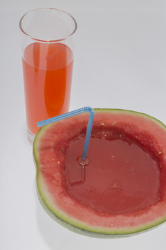 melon with melon Juice on White background